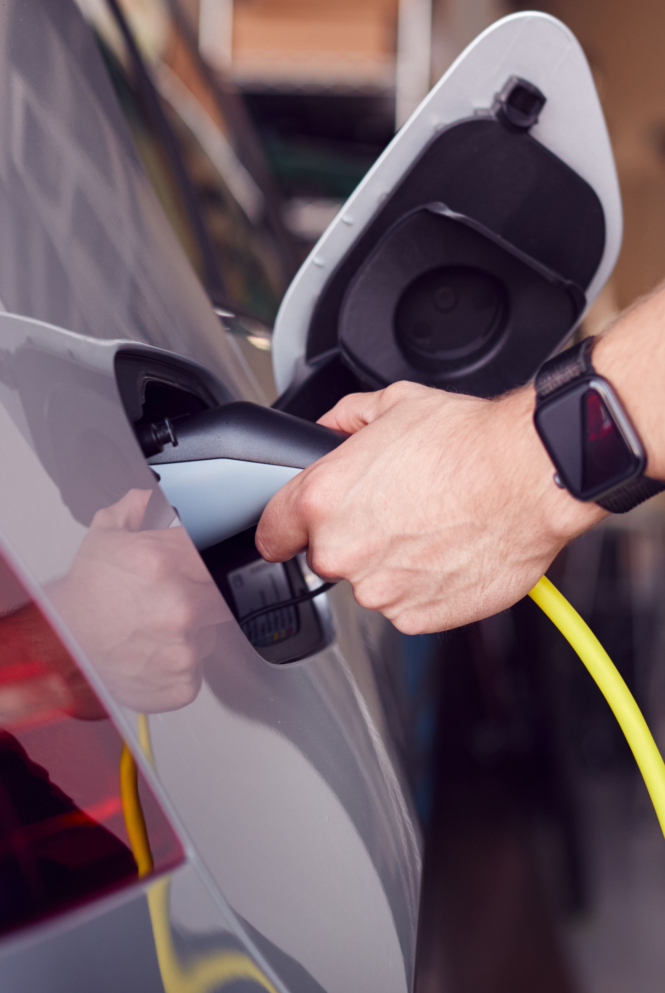 Electric vehicle being charged