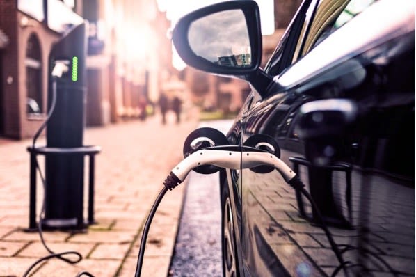 Electric car charging on the street