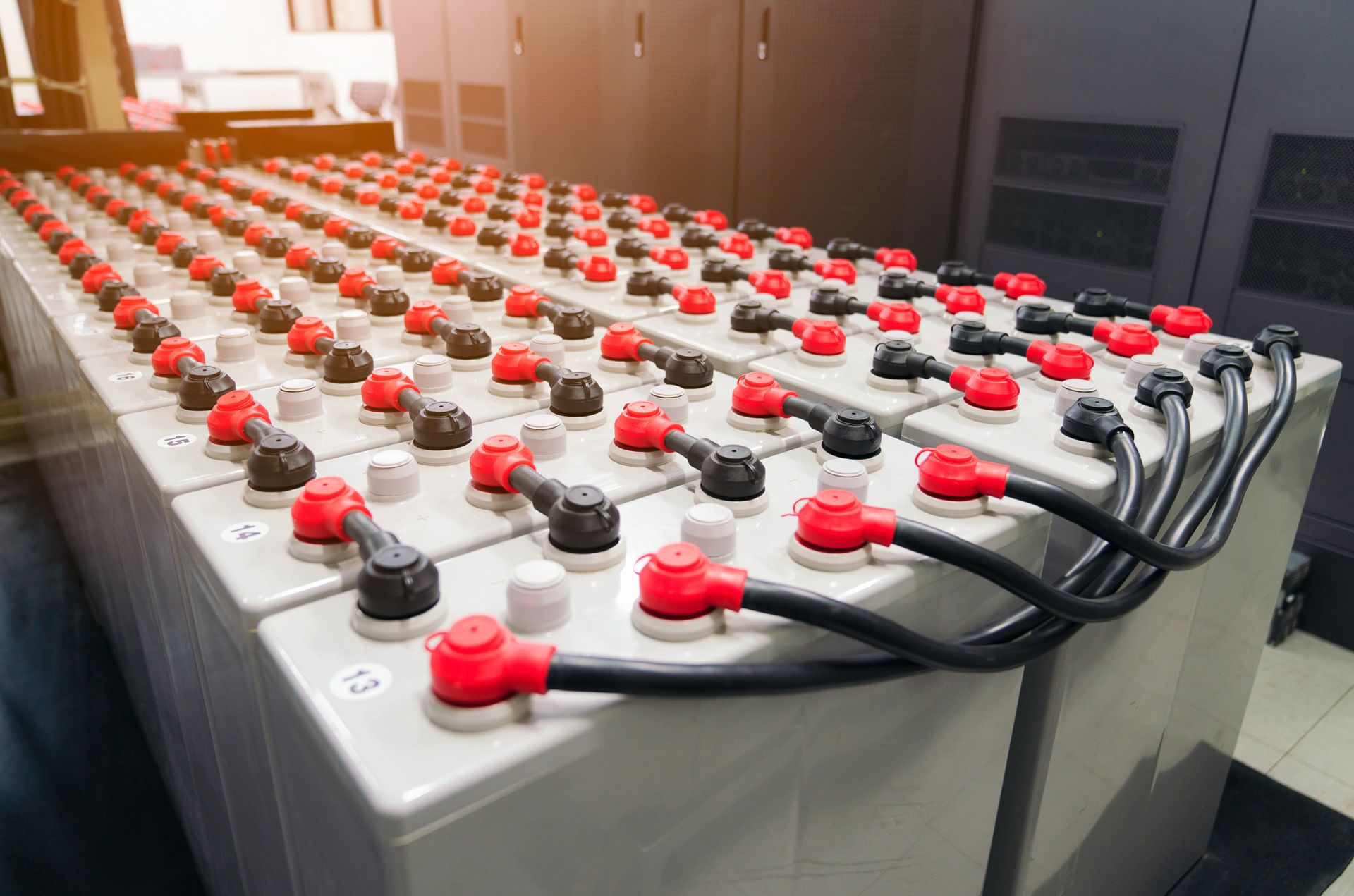 Rows of batteries in an industrial backup power system