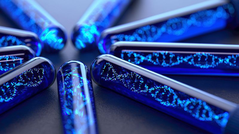 A background image of test tubes containing DNA