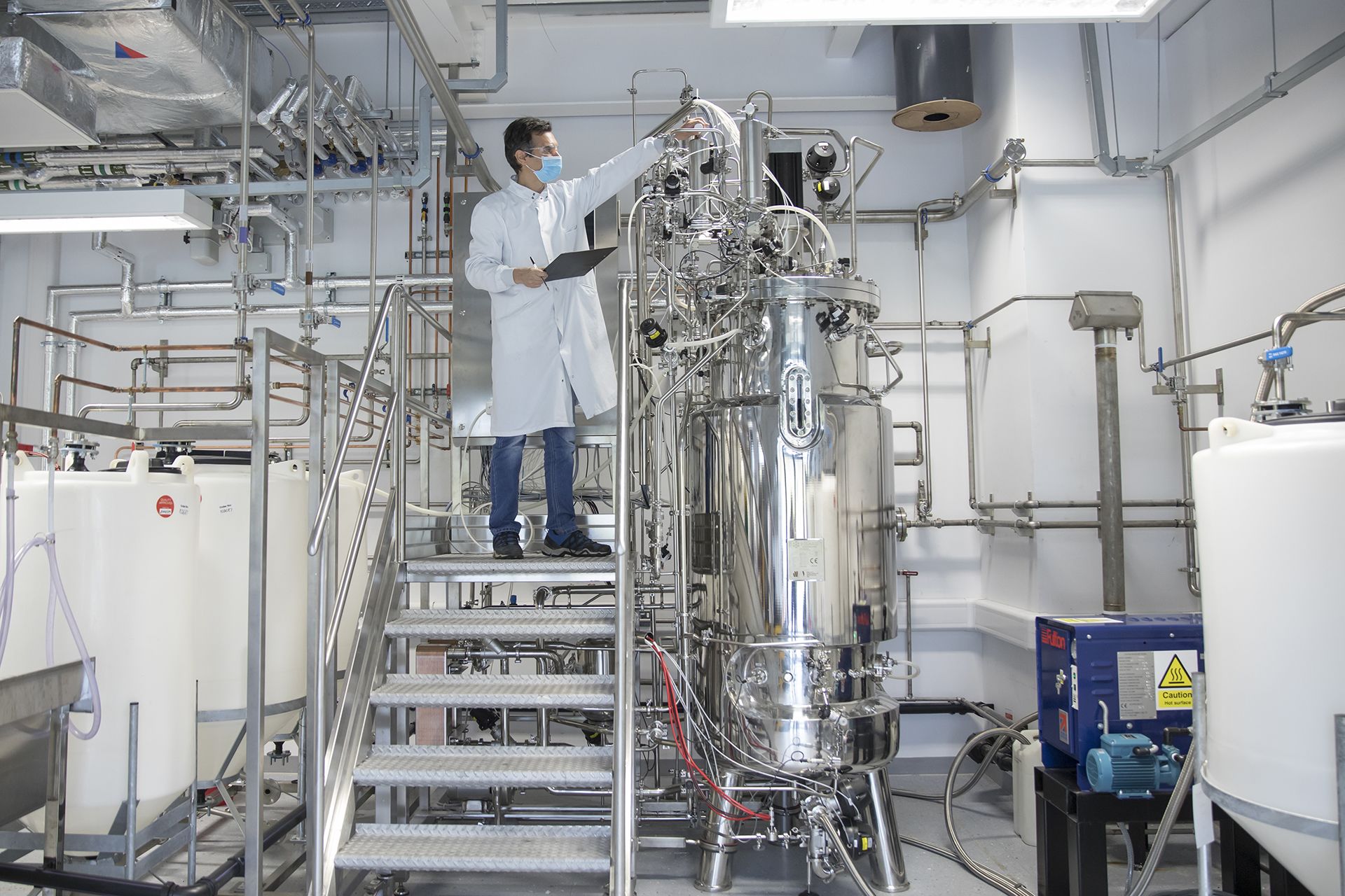A scientist on a platform testing equipment