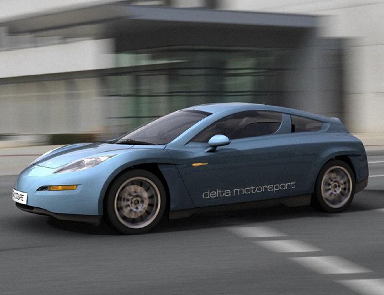 A light blue coupe car with white writing saying ‘delta motorsport’ horizontally on the door. The car sits in front of a blurred city background as if it is moving out from a junction.