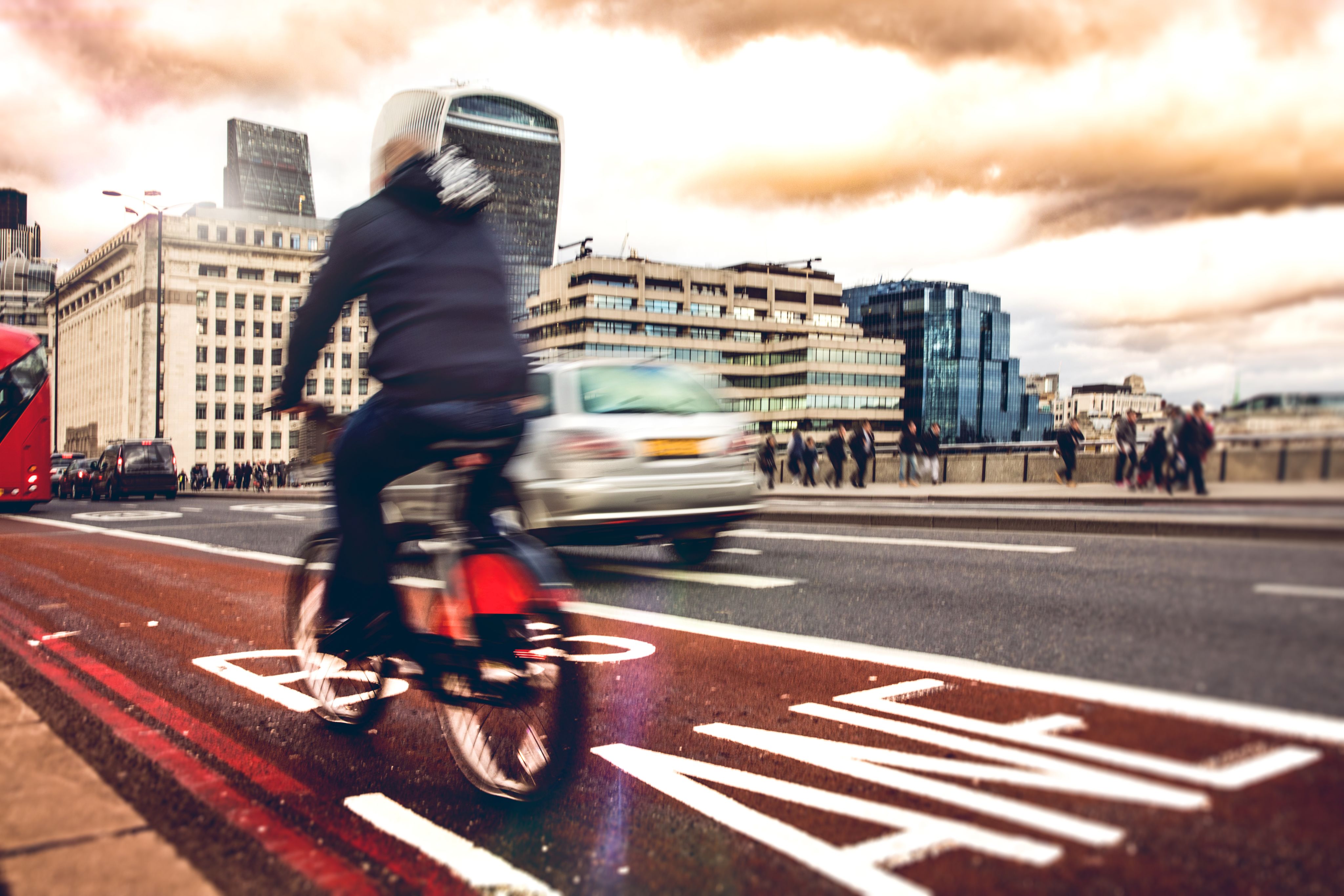 Bike lane in London with a cyclist in the traffic