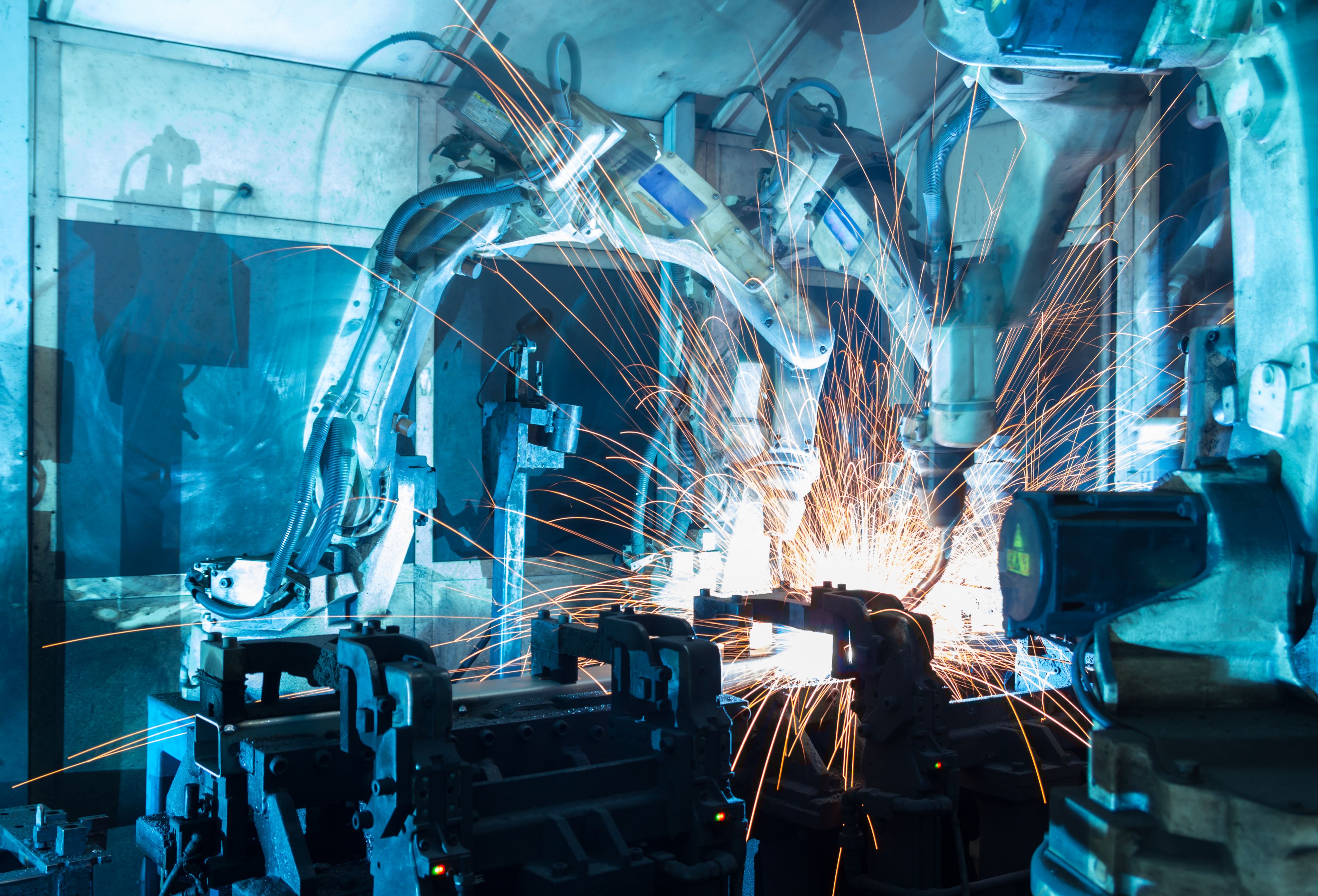 Robotic arms working inside a factory