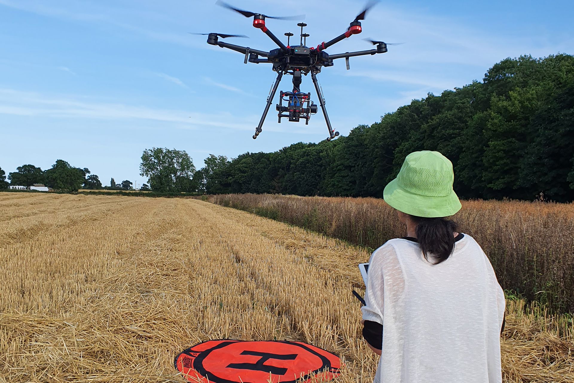 Drone landing after surveying the Long Plantation Woodland in Norfolk, UK