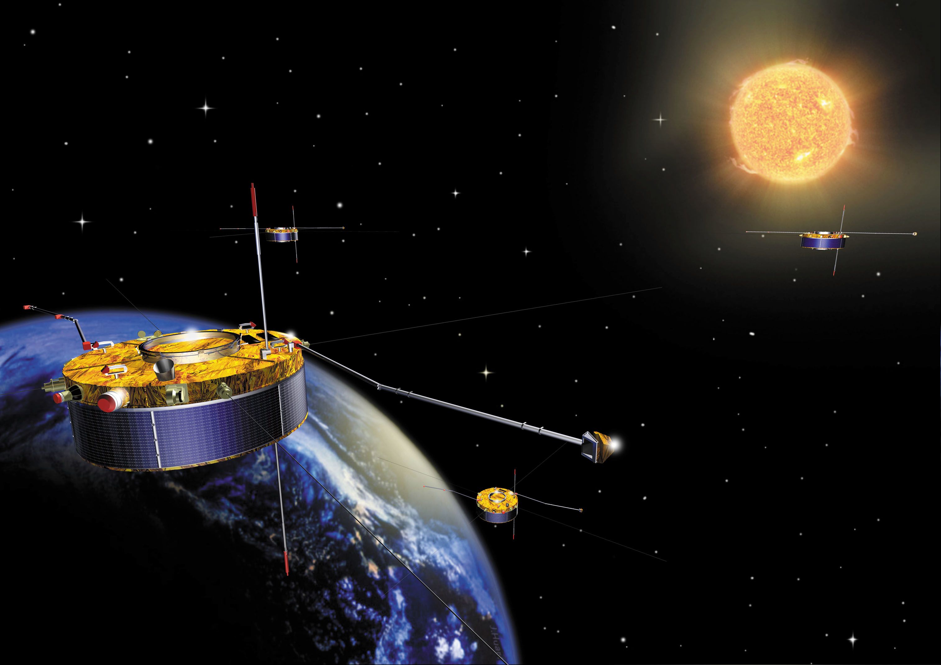 Artist’s impression of the four Cluster spacecraft orbiting the Earth, with the Sun in the background.