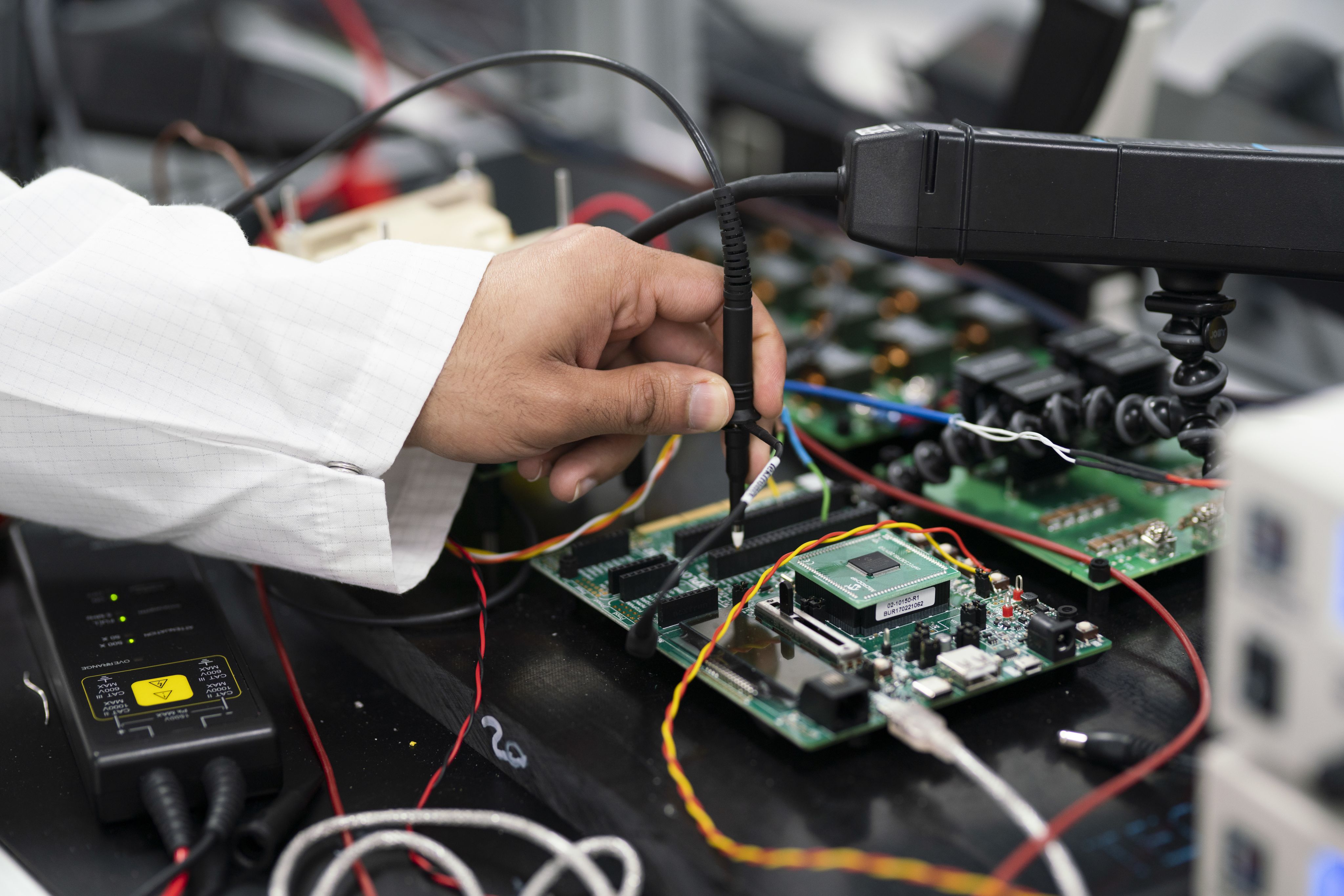A technician tests semiconductor technology